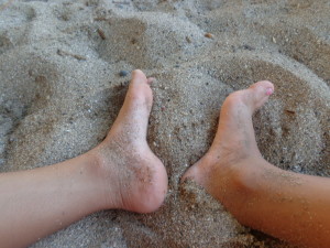 enjoying the volcanic sand